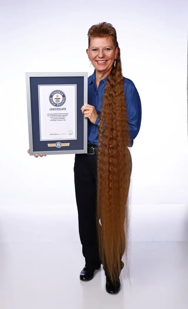 "Рекорд Гиннесса": Тами Малис - обладательница самой длинной в мире прически