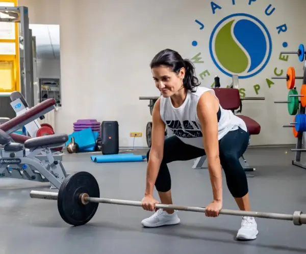 Вільні ваги чи тренажери. Що краще?